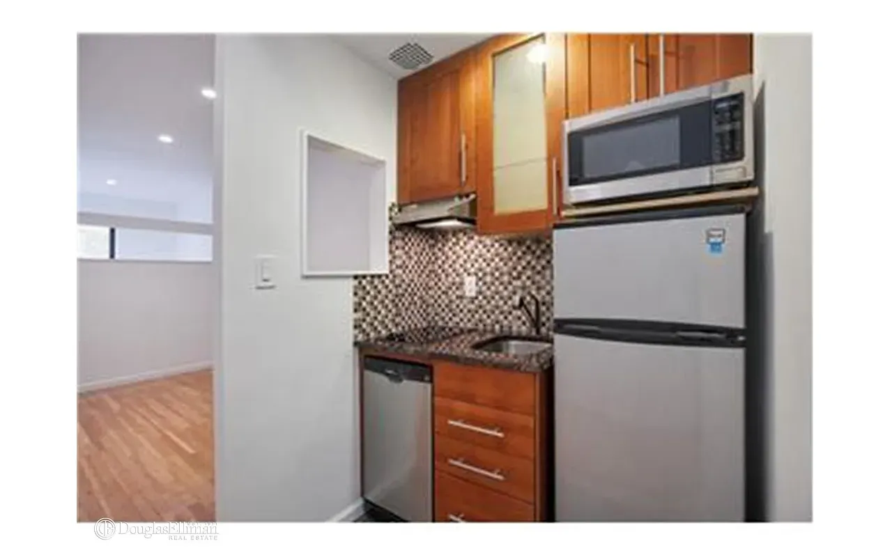 The Jessica Peters Team - 230 East 52nd Street #3D 1 of 15