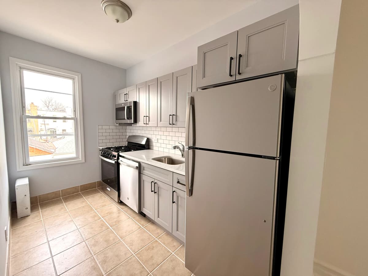 Jennyrose Halupka - 1675 85th Street #2R 1 of 15